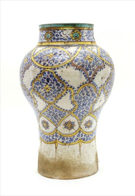 Lot 289 - A large Persian stoneware vase of baluster form