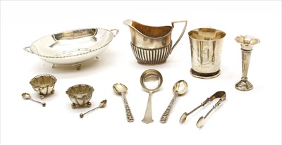 Lot 65 - A silver twin handled sweet meat dish of oval form