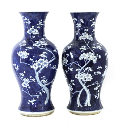 Lot 11 - A pair of Chinese blue and white vases