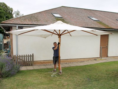 Lot 957 - A large 'Country House' terrace folding umbrella