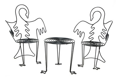 Lot 1248 - A pair of ‘Swan’ wire work garden chairs and a small table