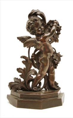 Lot 366 - An antique bronze cherub door stop