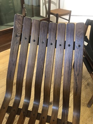 Lot 390 - A rosewood dining suite