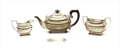 Lot 137 - A silver three piece tea set