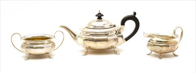 Lot 156 - A silver three piece teaset