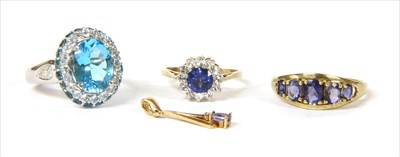 Lot 53 - A white gold blue topaz cluster ring