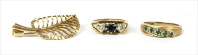 Lot 36 - A 9ct gold sapphire and diamond ring