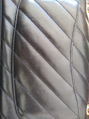 Lot 410 - A Chanel black chevron flap bag