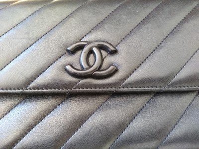 Lot 410 - A Chanel black chevron flap bag