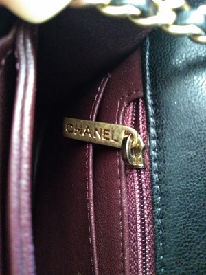 Lot 410 - A Chanel black chevron flap bag