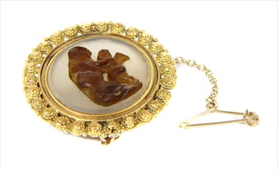 Lot 28 - A Regency gold composite cameo brooch