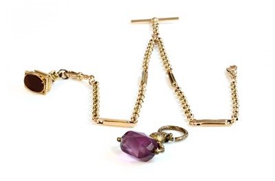 Lot 486 - An Edwardian gold hollow double albert chain and two seal fobs