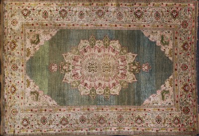 Lot 847 - A Persian silk tabriz rug