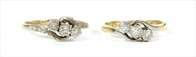 Lot 24 - A gold three stone diamond ring