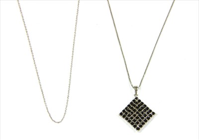 Lot 76 - A 9ct white gold pendant and chain