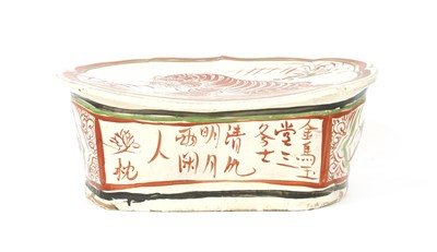 Lot 222 - A Chinese pottery pillow