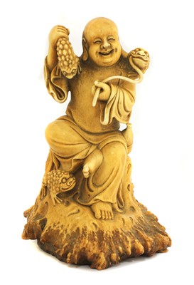 Lot 81 - A Chinese stag antler carving of Liu Hai