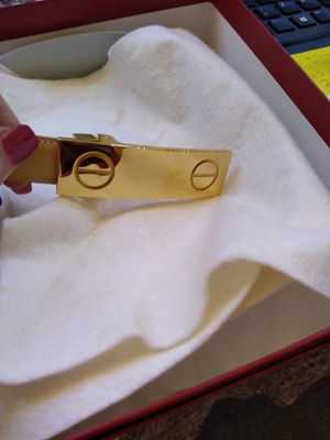 Lot 247 - A Cartier beige leather 'Love' belt