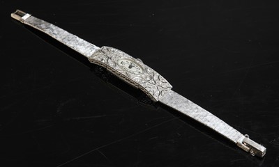 Lot 115 - A ladies' Art Deco diamond set cocktail watch, c.1930