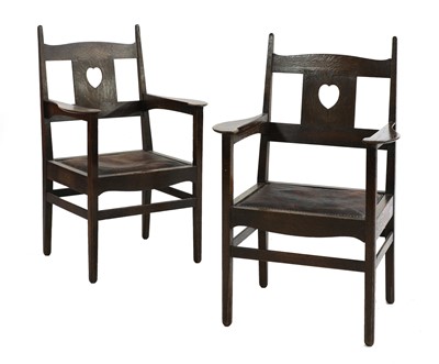 Lot 224 - A pair of rare Arts and Crafts oak armchairs