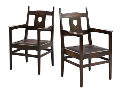Lot 224 - A pair of rare Arts and Crafts oak armchairs