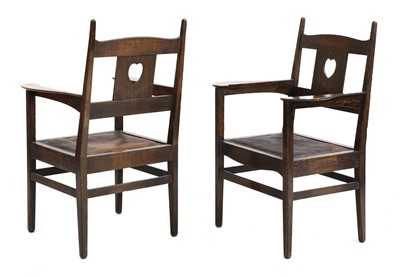 Lot 224 - A pair of rare Arts and Crafts oak armchairs