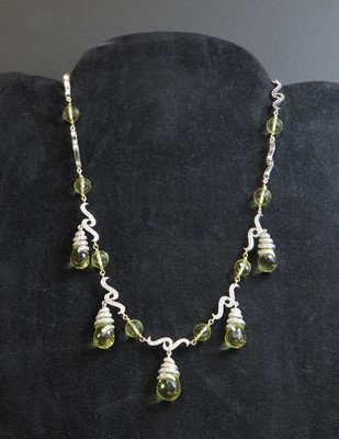 Lot 202 - A two colour gold citrine or lemon quartz necklace and earring suite