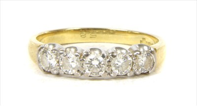 Lot 81 - An 18ct gold five stone diamond ring