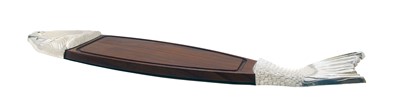 Lot 93 - A hardwood and polished metal salmon carving board