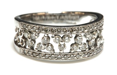 Lot 277 - A platinum diamond set band ring
