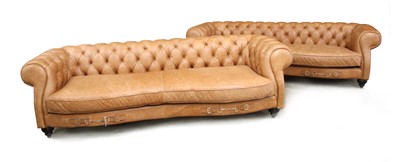 Lot 1248A - A pair of tan leather button upholstered Gucci style settees