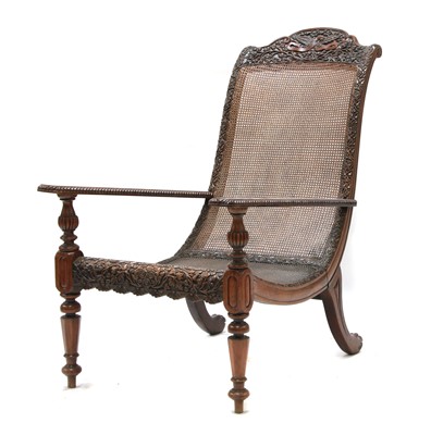 Lot 193 - An Anglo-Indian padouk bergère open armchair