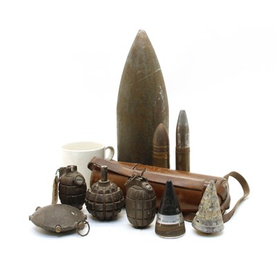 Lot 1033 - Munitions: including 2 hand grenades, two brass cased shells, etc