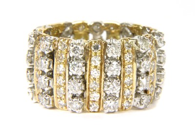 Lot 76 - A two colour gold diamond set band ring