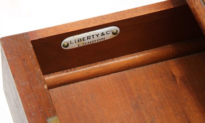 Lot 47 - A Liberty & Co. walnut desk