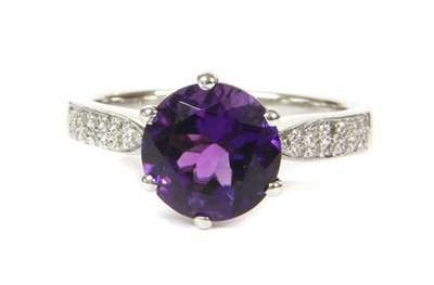 Lot 145 - An 18ct white gold amethyst and diamond ring