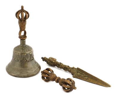 Lot 136 - A collection of bronze Buddhist attributes