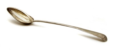 Lot 247 - A Georgian Old English pattern strainer spoon
