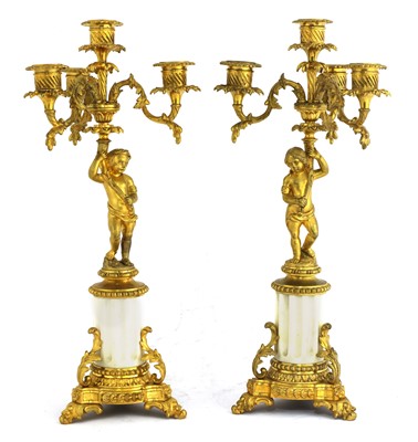Lot 160 - A pair of Gustavian ormolu and marble-mounted four-branch candelabra