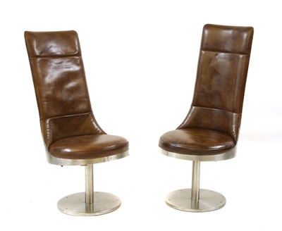 Lot 890 - A near pair of chrome and leather aviator type swivel chairs
