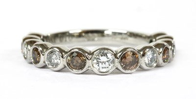 Lot 223 - A platinum diamond half eternity ring
