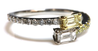 Lot 270 - A platinum two stone diamond crossover ring