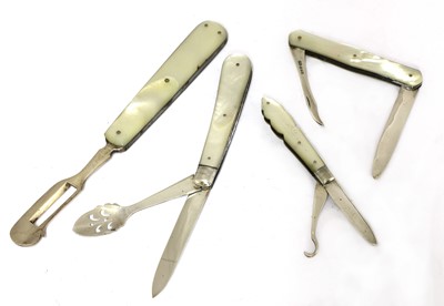 Lot 23 - Three silver and mother-of-pearl combination folding fruit knives
