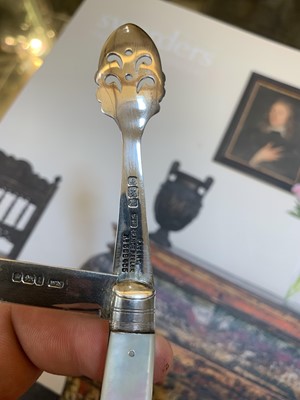 Lot 23 - Three silver and mother-of-pearl combination folding fruit knives