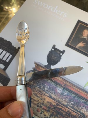 Lot 23 - Three silver and mother-of-pearl combination folding fruit knives