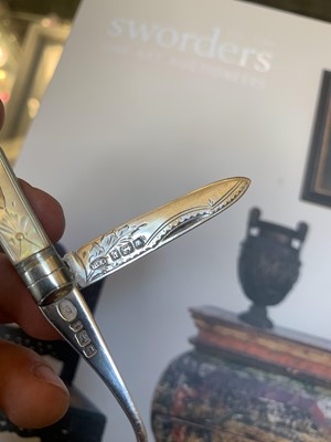 Lot 23 - Three silver and mother-of-pearl combination folding fruit knives