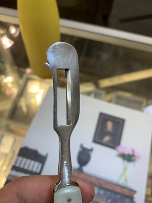 Lot 23 - Three silver and mother-of-pearl combination folding fruit knives