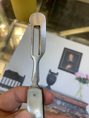 Lot 23 - Three silver and mother-of-pearl combination folding fruit knives