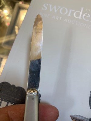 Lot 23 - Three silver and mother-of-pearl combination folding fruit knives