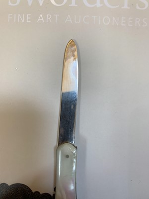 Lot 23 - Three silver and mother-of-pearl combination folding fruit knives